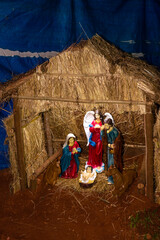 Rustic Christmas Cribs on display in Goa India. Hand crafted and painted Mockup and real life figurines of Nativity scene.