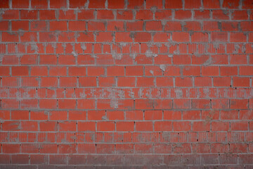 brick wall with cement orange color photo background building apartment decoration rough repair