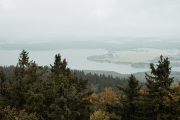 View on the Lipno dam and autumn trees from Vitkuv castle, Sumava mountains, Czech republic
