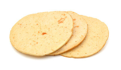 A stack of corn tortillas on a white background