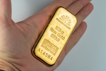Kyiv, Ukraine - December 05, 2018: A gold bar produced by the Swiss factory Argor-Heraeus - is one...