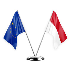 Two table flags isolated on white background 3d illustration, european union and monaco