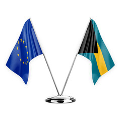 Two table flags isolated on white background 3d illustration, european union and bahamas