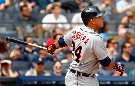 Detroit Tigers' Cabrera watches a solo home run off of New York Yankees starting pitcher Hughes during the third inning of their MLB American League baseball game at Yankee Stadium in New York