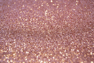 Pink de focused sparkle glitter background close up, bokeh texture