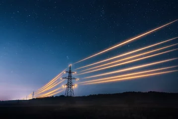Fotobehang Electricity transmission towers with orange glowing wires the starry night sky. Energy infrastructure concept. © Артур Ничипоренко