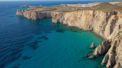 Aerial drone photo of beautiful emerald crystal clear beach and rocky bay of Plathiena, Milos island, Cyclades, Greece