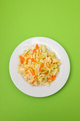 salad fresh cabbage with carrot on white dish