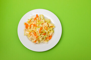 salad fresh cabbage with carrot on white dish