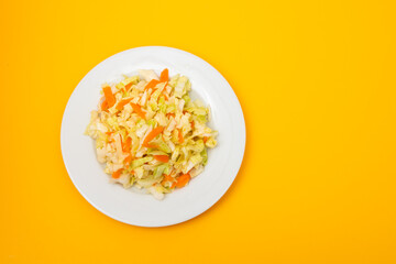 salad fresh cabbage with carrot on white dish