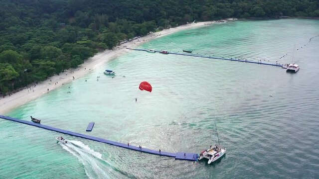 Coral island, koh He, beach and boats in Phuket province, Thailand