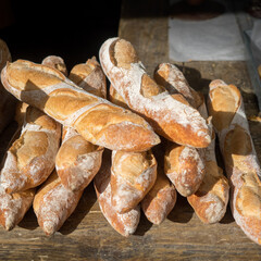 Baguette loaves of bread on a market stall