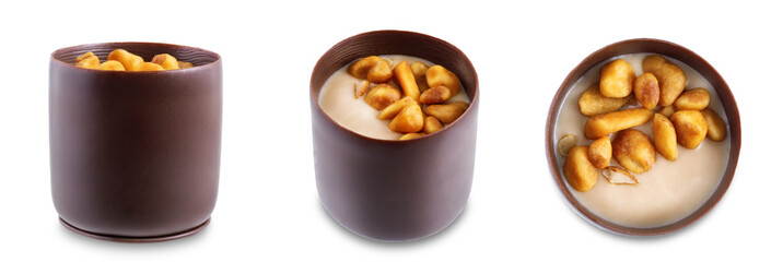 Dark chocolate nut cream roasted nuts candy on a white isolated background