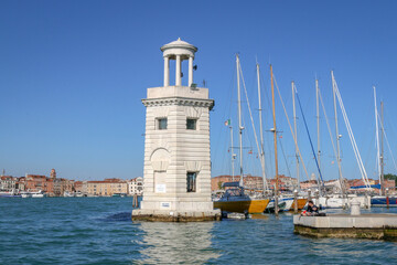 Fototapeta na wymiar Lighthouse at San Giorgio Maggiore, an island of Venice