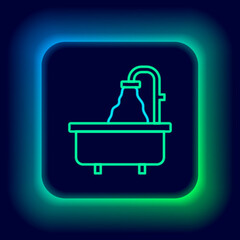 Glowing neon line Bathtub icon isolated on black background. Colorful outline concept. Vector