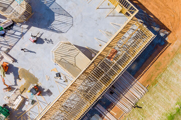 House under construction of wooden beams at construction the roof of air conditioner vents