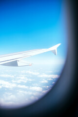 Fototapeta na wymiar Plane wing view from the airplane window