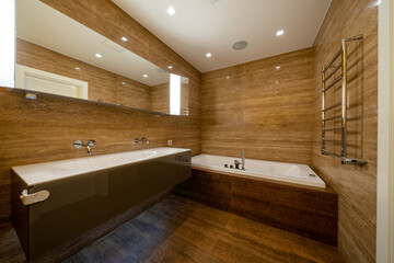 Comfortable white bathtub. Beautiful apartment, interior, bathroom. Modern contemporary architecture, interior, bathroom