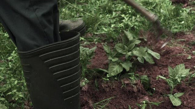 A man at work on the plot.