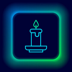 Glowing neon line Aroma candle icon isolated on black background. Colorful outline concept. Vector