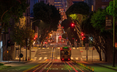 San Francisco cable car at night - Powered by Adobe