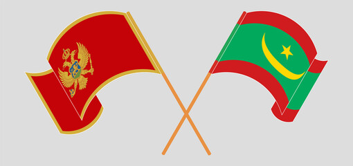 Crossed and waving flags of Montenegro and Mauritania