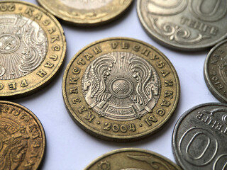Close-up of coins of the Republic of Kazakhstan on a white background. Currency photography