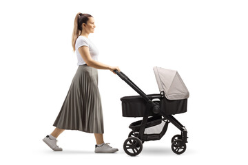 Full length profile shot of a young mother pushing a baby stroller - obrazy, fototapety, plakaty