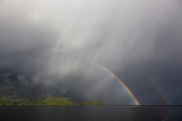 Storm break rainbow.  Tofino, Clayoquot Sound, Vancouver Island, B.C., Canada.