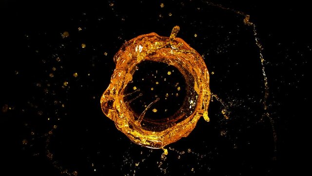Super Slow Motion Shot of Rotating Oil Whirl Isolated on Black Background at 1000fps.