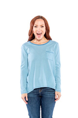 A woman with long red hair, wearing a blue and white striped shirt is very excited.