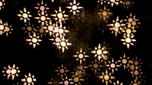 Abstract blurry, low depth of field bokeh light shapes. Vivid, colourful light effects, 4K background video clip with different shapes and dots in various colours. Perfect for Christmas backgrounds