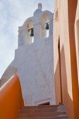 Stairs Amidst Orange Walls and Church, Oia, Santorini, Greece