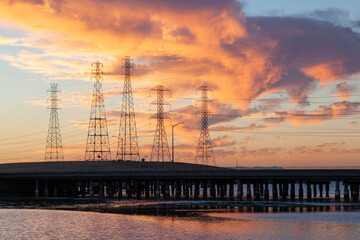 Electrical Pylons by Bridge at Sunset, San Mateo, CA, US - obrazy, fototapety, plakaty