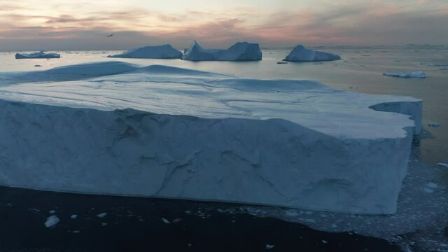 icebergs floating from aerial view in 4k