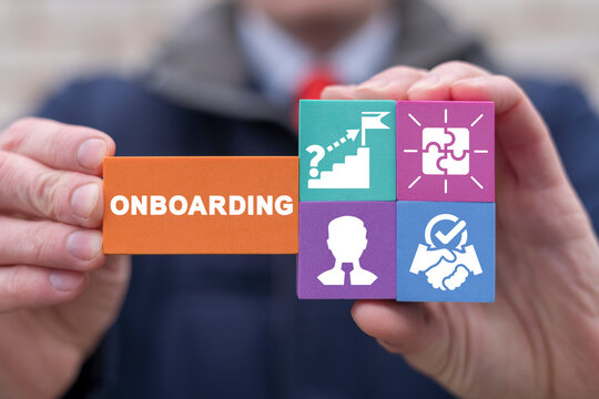 Onboarding Business Process New Employee Welcome Concept. Businessman holding colorful polystyrene blocks with onboarding conceptual presentation.