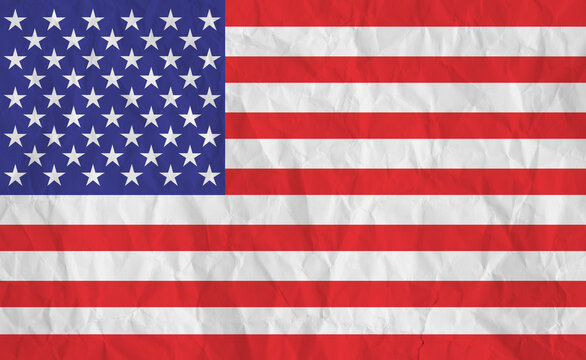 Flag of the United States of America on creased crumpled paper