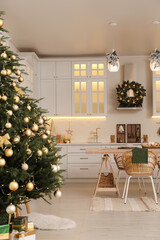 Cozy spacious kitchen decorated for Christmas. Interior design
