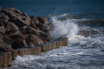 wave crashing on rocks