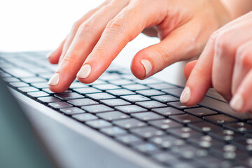 Woman works on PC. Female hands on a computer keyboard close-up. Girl is typing on a laptop. Female hands touching keys of laptop. Office work. Correspondence by e-mail. Communication on the Internet