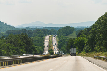 Virginia interstate highway i81 81 steep road with traffic cars trucks in summer and scenic trip...