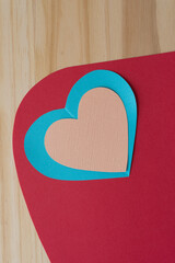 background design with paper hearts and wood