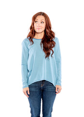 A woman with long red hair, wearing a blue and white striped shirt is looking up and thinking.