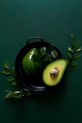 Sliced raw avocado all green arrangement. Flat lay, top view. Creative food concept.