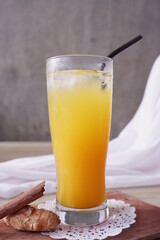 Tamarind turmeric or Kunyit Asam is a traditional Indonesian drink, served with ice cubes, useful for increasing endurance and health. made from tamarind, turmeric extract and sugar