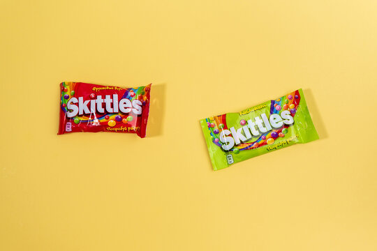 Tyumen, Russia-December 27, 2021: Original Skittles brand candies. Multicolored background. delicious sweet skittles
