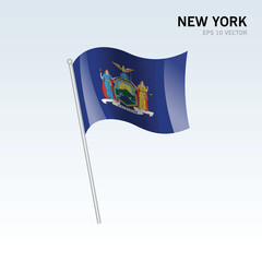 Waving flag of New York state of United States of America on gray background