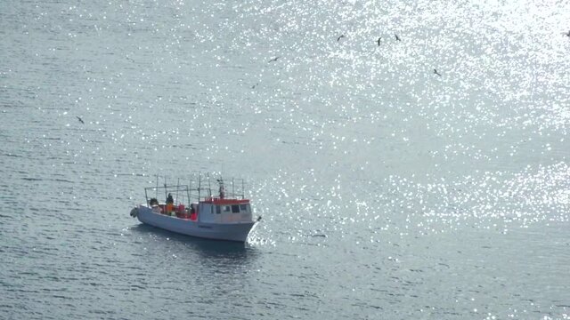 Italian fishing boat parked on the sea，Lipari island,sicily,italy