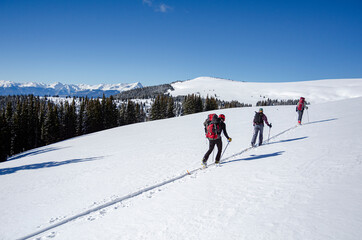 skiing across the backcountry of colorado