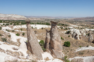 Beautiful view of the valley of love in Cappadocia with mountain peaks in the summer day